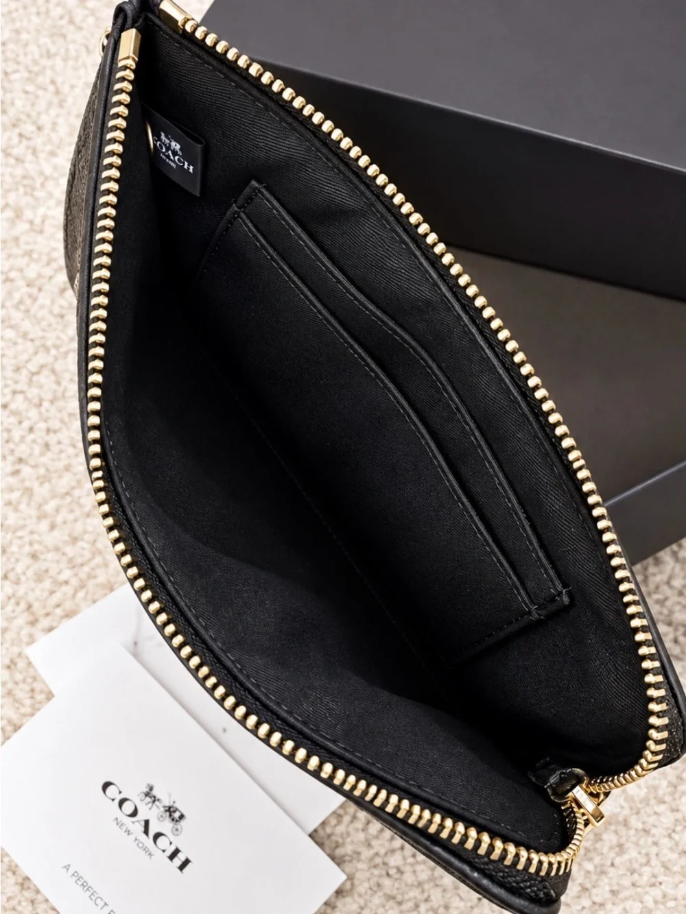 Coach Black Pebbled Leather Wristlet with Gold Logo